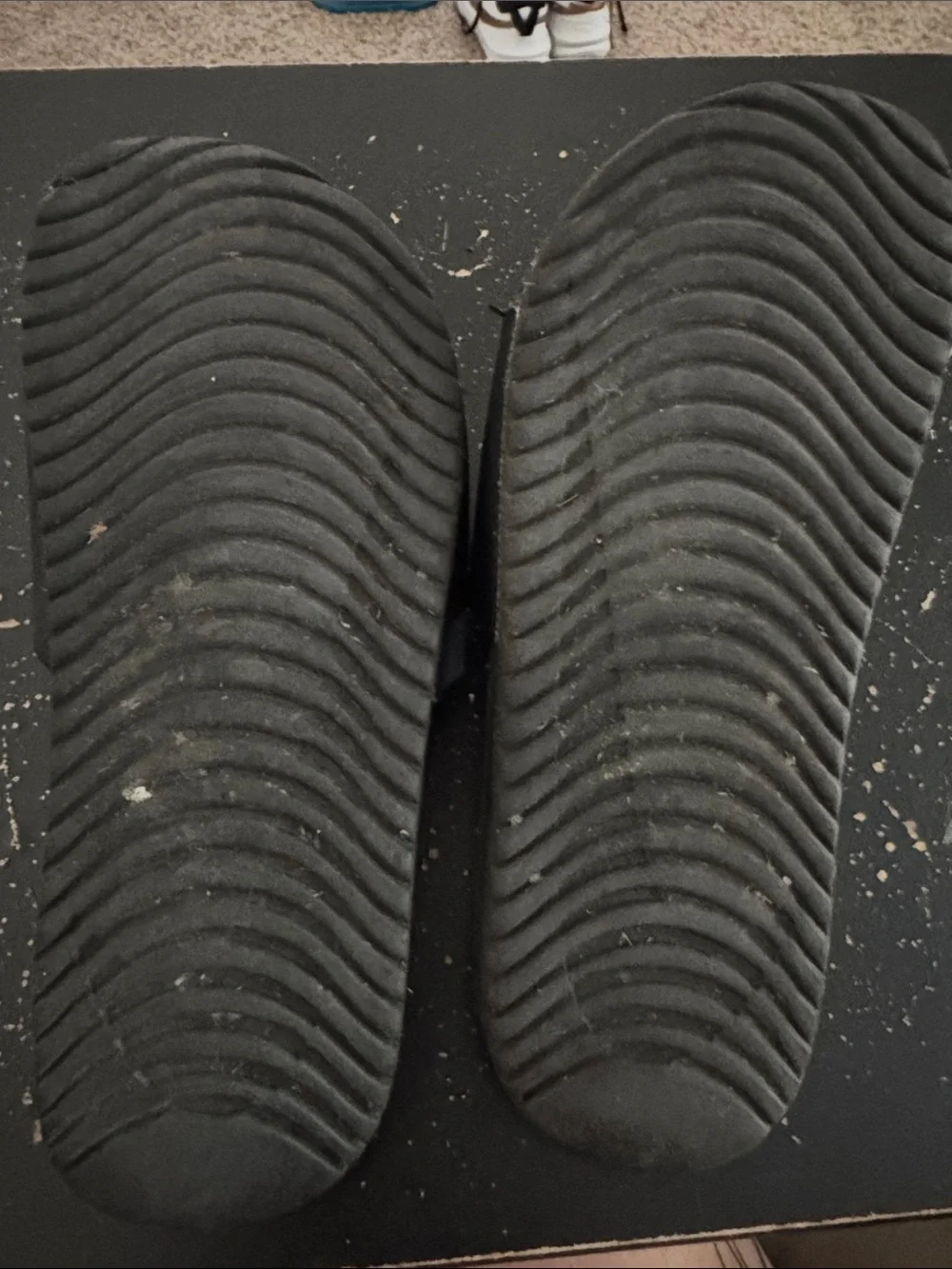 Nike Black Slides with White Swoosh Logos